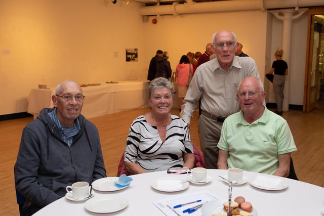 Michael Hyde, Marjorie Baird, Michael Oates and Frank McCaffrey at the coffee morning and reunion for former staff of Crossley Carpets at Dean Clough