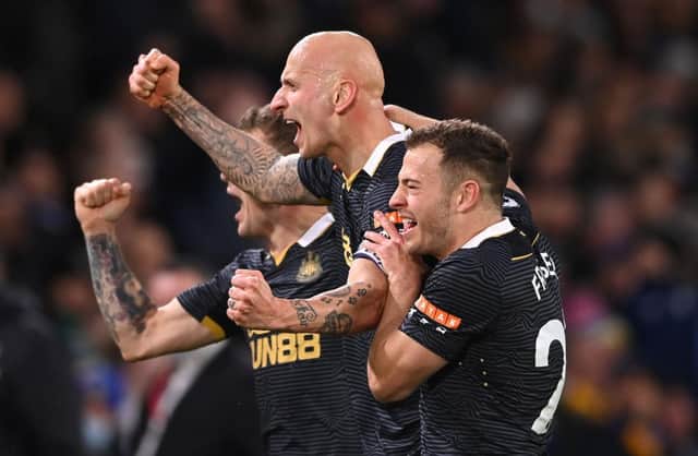Jonjo Shelvey, Ryan Fraser and Kieran Trippier celebrating Newcastle United's opening goal against Leeds United (Photo by Stu Forster/Getty Images)