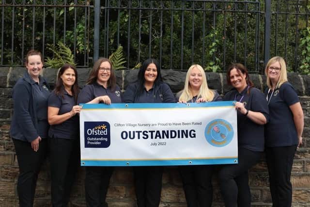 Staff at Clifton Village Nursery with their 'Outstanding' rating