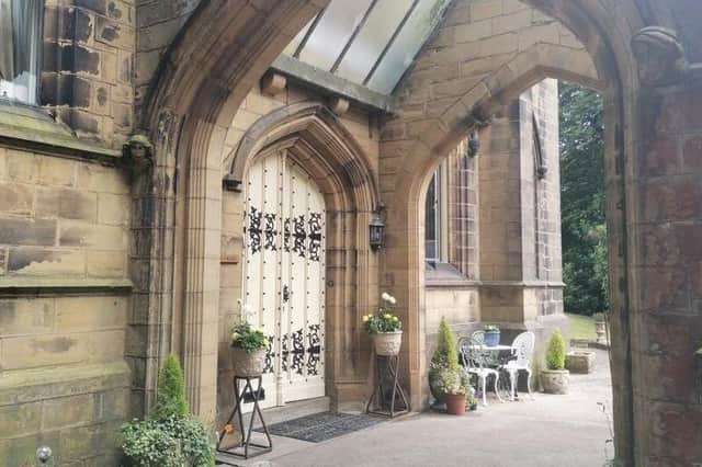 This stunning porch was designed to allow horses and carriages to pass through it, in front of the doorway.