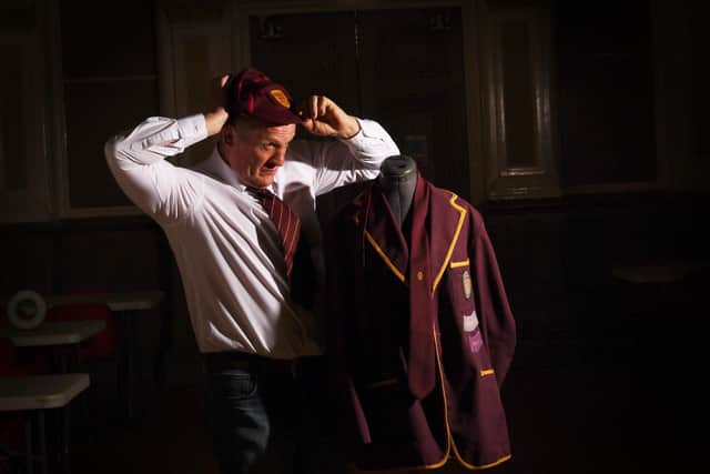 Artifacts and exhibits on show at The Crossley Heath School, Savile Park, Halifax. Former Head Boy Jon Hamer pictured with his original prefects 6th Form Blazer from 1982.  Picture taken by Yorkshire Post Photographer Simon Hulme 28th March 2023










