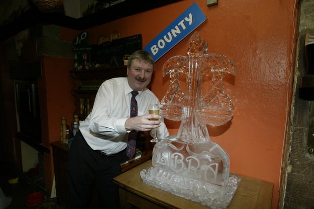 The Alma Landlord David Giffon with the ice sculpture which represents Zodiac sign Libra celebrating his 50th birthday at the pub back in 2003.