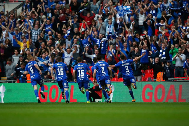 LONDON, ENGLAND - MAY 22:  Scott McManus of FC Halifax Town celebrates his goal with teammates during the FA Trophy Final match between Grimsby Town FC v FC Halifax Town at Wembley Stadium on May 22, 2016 in London, England.  (Photo by Joel Ford/Getty Images)