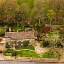 An overview of the 1633 restored property in its lovely setting.