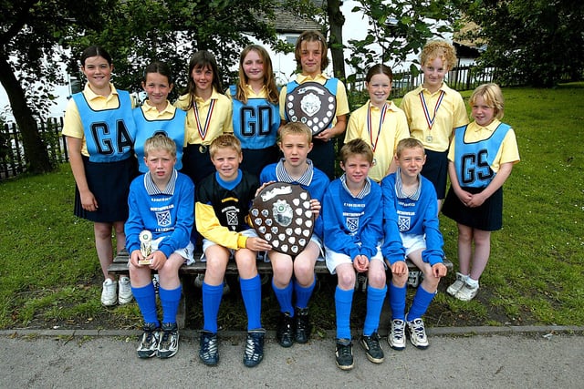 Northowram J&I School's netball and football teams, pictured in 2002.