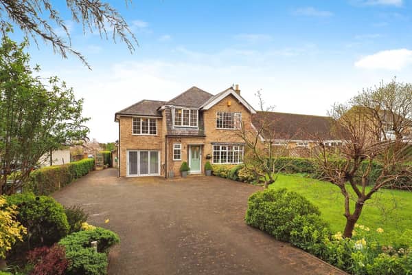 This four bedroom detached property in Brighouse is on the market for £525,000 with Yopa.