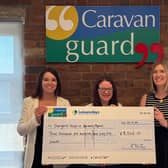 Staff at Caravan Guard have raised more than £3,500 for Overgate Hospice