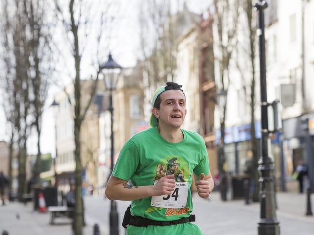 Halifax Urban Trail run through the town's iconic landmarks for Overgate Hospice. Corn Market