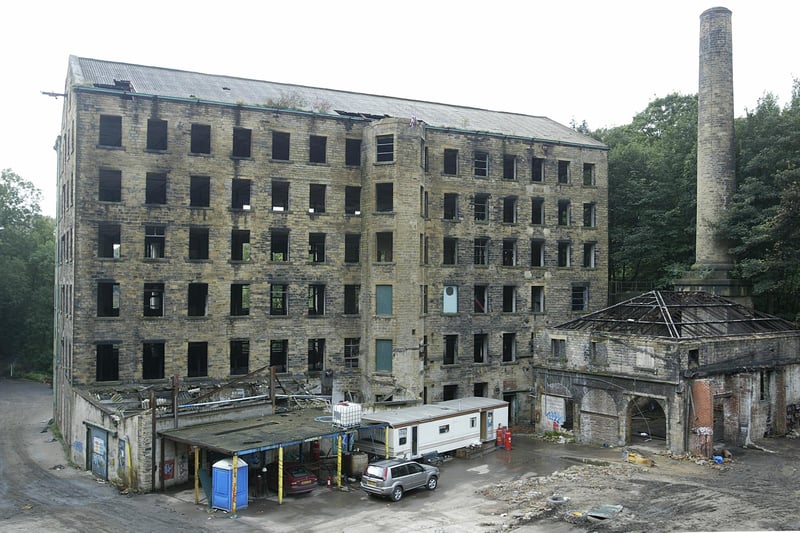 Worsted mill of 1825 to 1828, the oldest and largest surviving example of a multi-storey, steam-powered, iron-framed textile mill in Halifax. Unoccupied and in poor repair. This site has been subject to heritage crime. Planning and Listed building consent have been applied for for conversion of the mill to residential apartments.