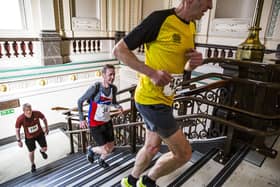 Hundreds ran through Halifax's historic landmarks, including Halifax Town Hall. Picture: Jim Fitton