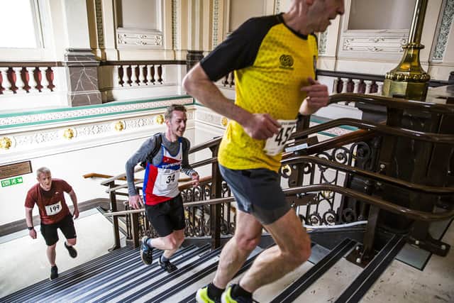 Hundreds ran through Halifax's historic landmarks, including Halifax Town Hall. Picture: Jim Fitton