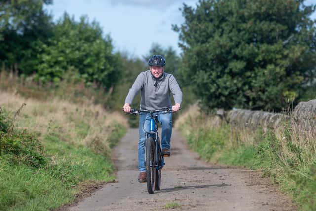 Pictured Carlton Smith, the new owner of Juiced Up Bikes, after he has just purchased the company from founder Bart Spicer.