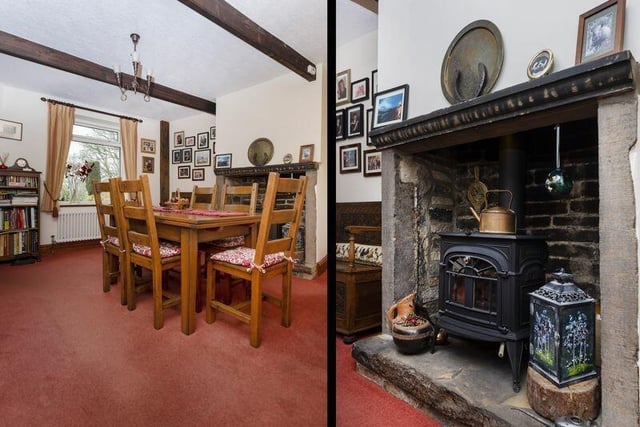 The beamed dining room is spacious, with a lovely old fireplace.