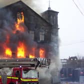 Flashback: Firefighters tackle the blaze at the imposing Clough Mills in Shelf in February 2005.