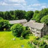 This detached seven bedroom property with two cottages and 58 acres of land is on the market for £1,950,000 with Charnock Bates