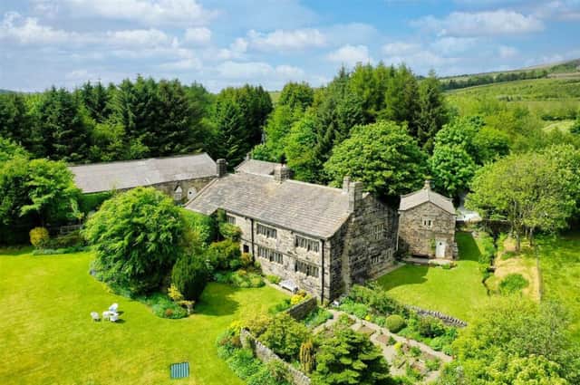 This detached seven bedroom property with two cottages and 58 acres of land is on the market for £1,950,000 with Charnock Bates