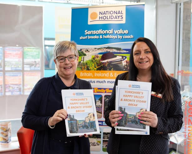 Karen Rowlands, left, and Katie Butler at Total Travel in Heckmondwike holding brochures for the newly launched Happy Valley tours