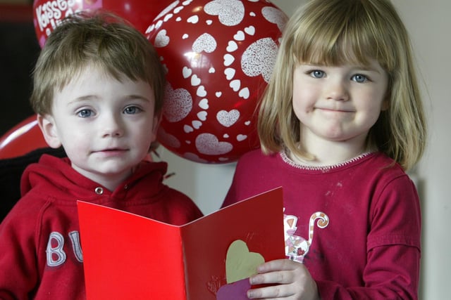 Two-year-old Joe Baxter and three-year-old Chloe Lamber with Valentine's Day cards at Triangle House Day Nursery in 2006