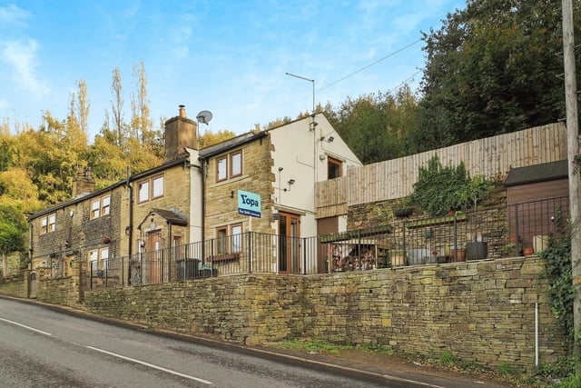 This two bedroom cottage-style property on Dewsbury Road, Elland is on the market for £250,000 with Yopa.