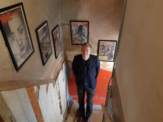 Michael Ainsworth inside The Grayston Unity's new home in Halifax town centre