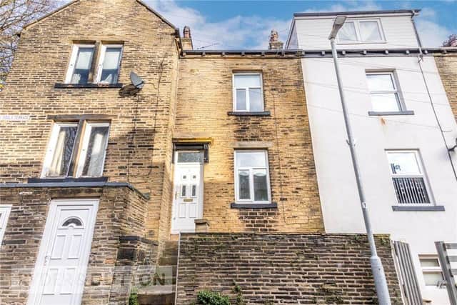 This two-bedroom terraced home for sale for £95,000 in All Souls Terrace, Boothtown, Halifax, HX3 6DX, has a large garden and parking space, is in a great location with easy access to Halifax town centre, and is chain free. Call 01422 433849 for details.
