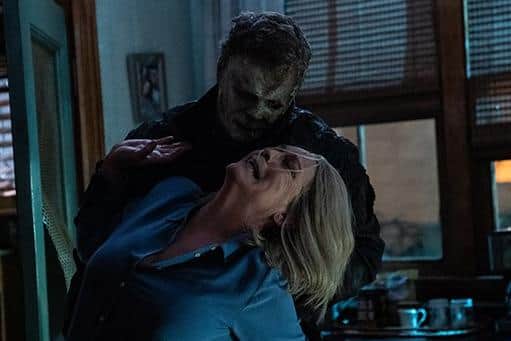 Michael Myers (aka The Shape) and Jamie Lee Curtis as Laurie Strode in HALLOWEEN ENDS