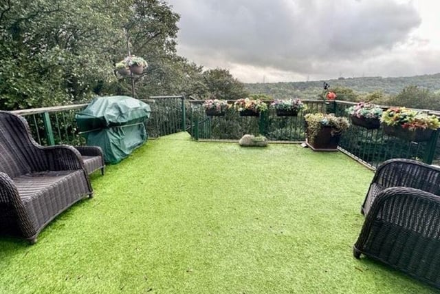 One of the garden areas, with artificial turf and panoramic views.