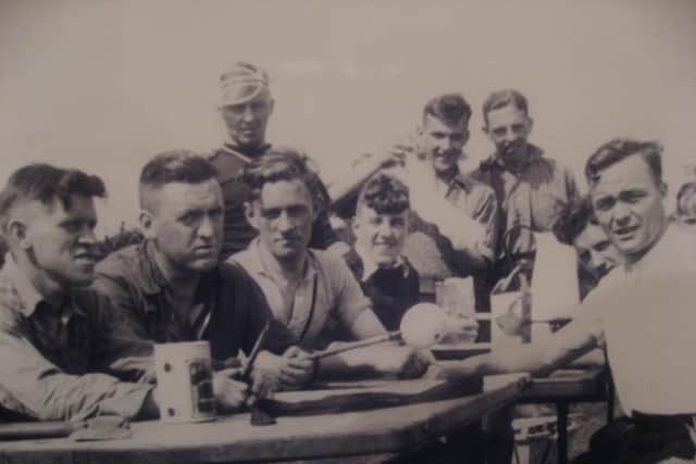 Group photo of David Moffatt, Halifax's Cockleshell hero (back with pipe) and fellow Royal Marine Commandos