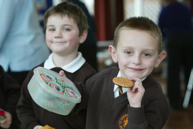Joseph Haley, five, and Matthew Rutter, four, at the Valentine's Day bun sale at St Joseph's School, Brighouse, in 2004