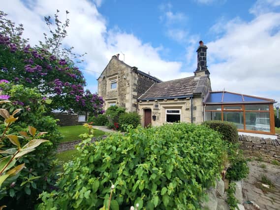 Northfield Gate Farm, Upper Lane, Northowram, Halifax, is priced at £475,000.