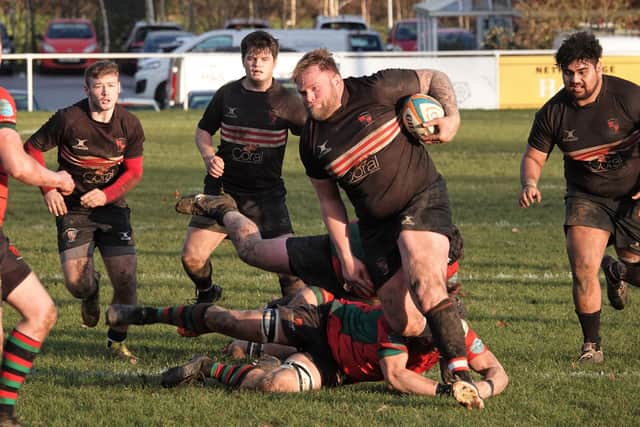 Lee Imiolek drives forward for Old Brodleians. Picture: Robin Sugden
