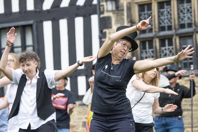 The Gentleman Jack flash mob perform in front of Shibden Hall.