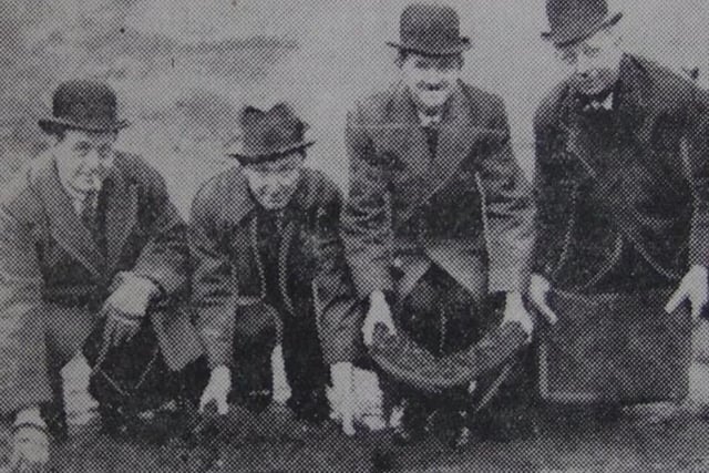 The first grass sods are laid by chairman Dr Howie Muir, secretary-manager Joe McClelland, and directors Edgar Denison and Joe Firth, December 1920.