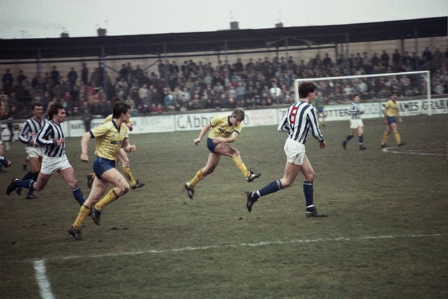 Barry Gallagher drives in a shot, Hartlepool v Town, February 11, 1984.