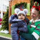 Isaiah Ntantu with Britney Hornsby the elf at Westgate Arcade last year