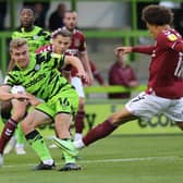 NAILSWORTH, ENGLAND - AUGUST 31:Jack Evans of Forest Green Rovers plays the ball under pressure during the Papa John's Trophy match between Forest Green Rovers and Northampton Town at The New Lawn on August 31, 2021 in Nailsworth, England. (Photo by Pete Norton/Getty Images)