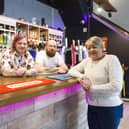 Landlady June Prior, right, with sons Jae Turner, left, and Chris Smith, centre, at Legends micropub, Halifax