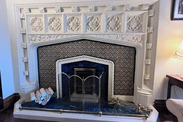 A close-up of the stunning fireplace within the lounge and dining room.