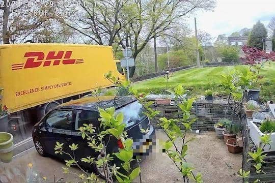 This photo shows how close the lorries are when they drive past people's homes