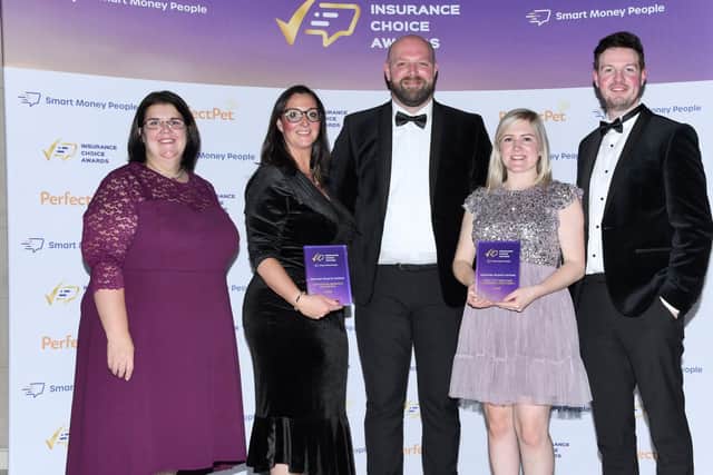 Caravan Guard customer service team with the two Insurance Choice Awards. Picture: Leo Wilkinson Photography