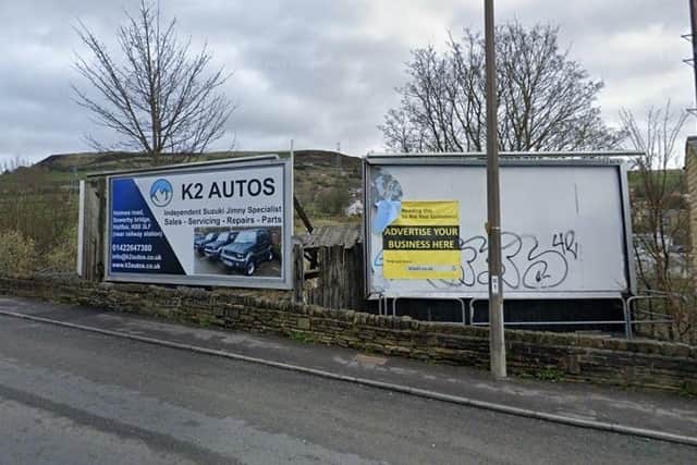 The shed site, which could become new homes, is behind some advertising hoardings at Ovenden Road, Halifax. Picture: Google