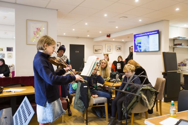 Aggie Daniels, 12, performs in the cafe at Calderdale Music