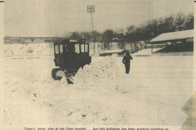 A bulldozer clears snow, January 30, 1979.