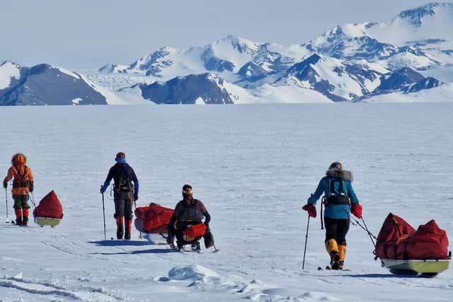 Karen Darke with teammates in Antarctica. Photo: Mike Webster