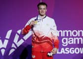 GLASGOW, SCOTLAND - JULY 27: Gold medalist Luke Whitehouse of Team England poses for a photo during the medal ceremony for the Men's Floor Exercise Final on day four of the Glasgow 2026 Commonwealth Games at The Arena on July 27, 2026 in Glasgow, Scotland. (Photo by Lintao Zhang/Getty Images)