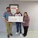 Ben and Gaynor present their cheque