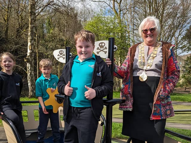 Students from Riverside School helped the Mayor of Hebden Royd, Coun Bernice Hayes, try out the new Spring-Ship in the spring sunshine.