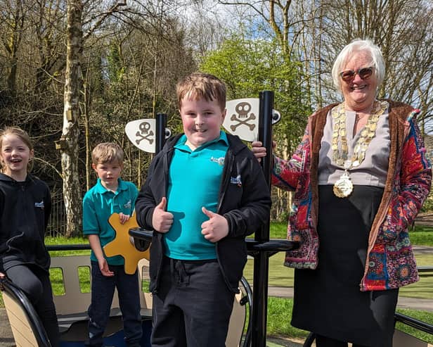 Students from Riverside School helped the Mayor of Hebden Royd, Coun Bernice Hayes, try out the new Spring-Ship in the spring sunshine.