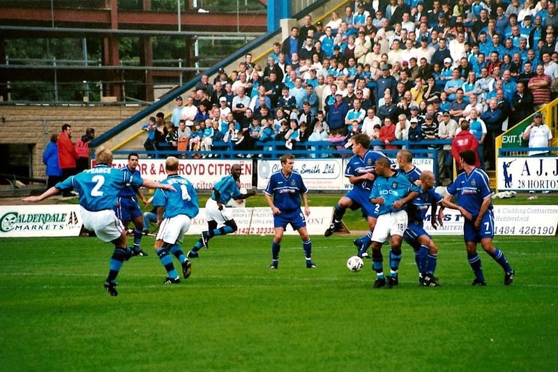 Stuart Pearce fires in a free-kick for Man City during a pre-season friendly at The Shay