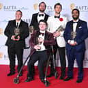 Jack Carroll and production crew pose with the Short Form Award for 'Mobility' in the Winners Room during the 2024 BAFTA Television Awards with P&O Cruises at The Royal Festival Hall. (Photo by Joe Maher/Getty Images)